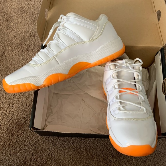 orange white jordan 11